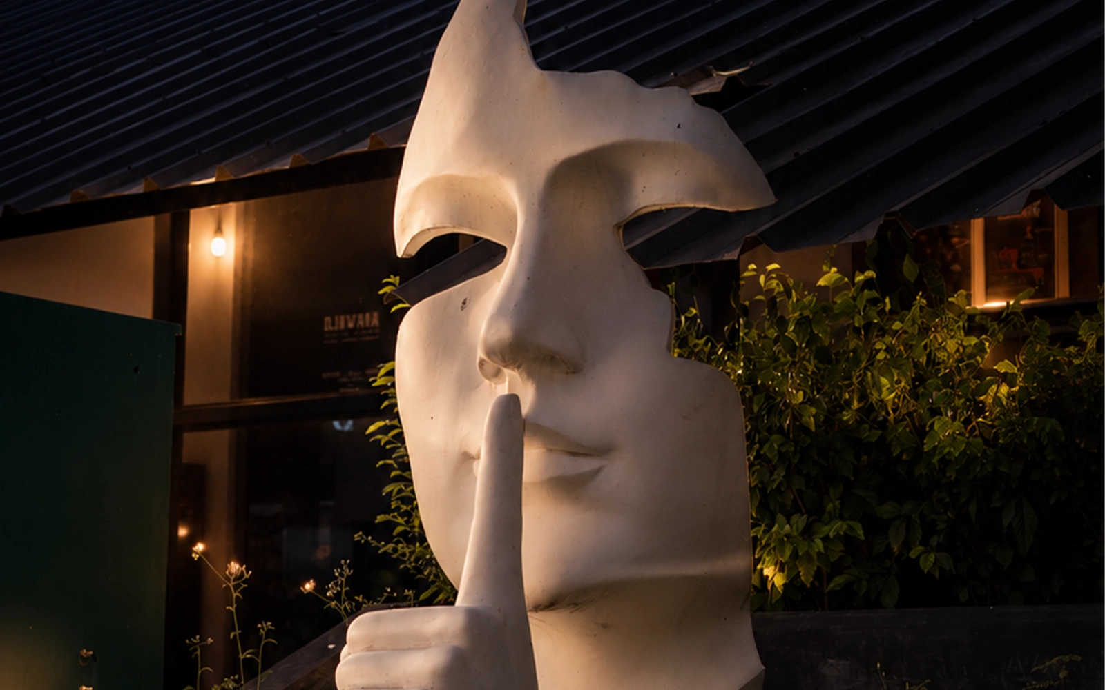 Tropical-modern DJAWARA placeholder entrance at dusk