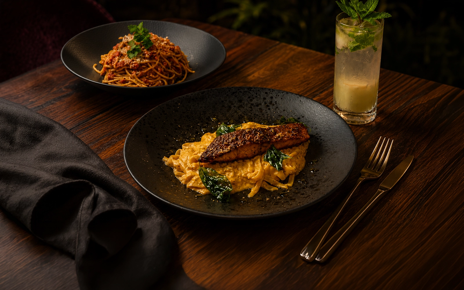 Indonesian-inspired dish in a candlelit dining room